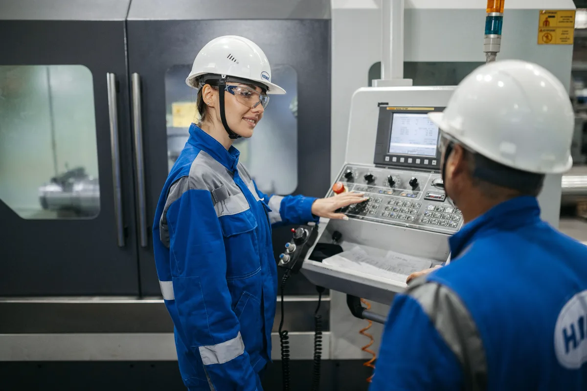 Operator at the control panel of an industrial installation